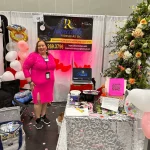 Shelly promoting her company at a business fare