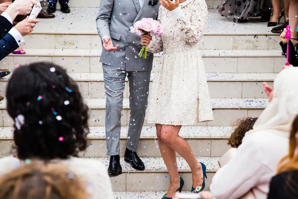 couple leaving wedding ceremony