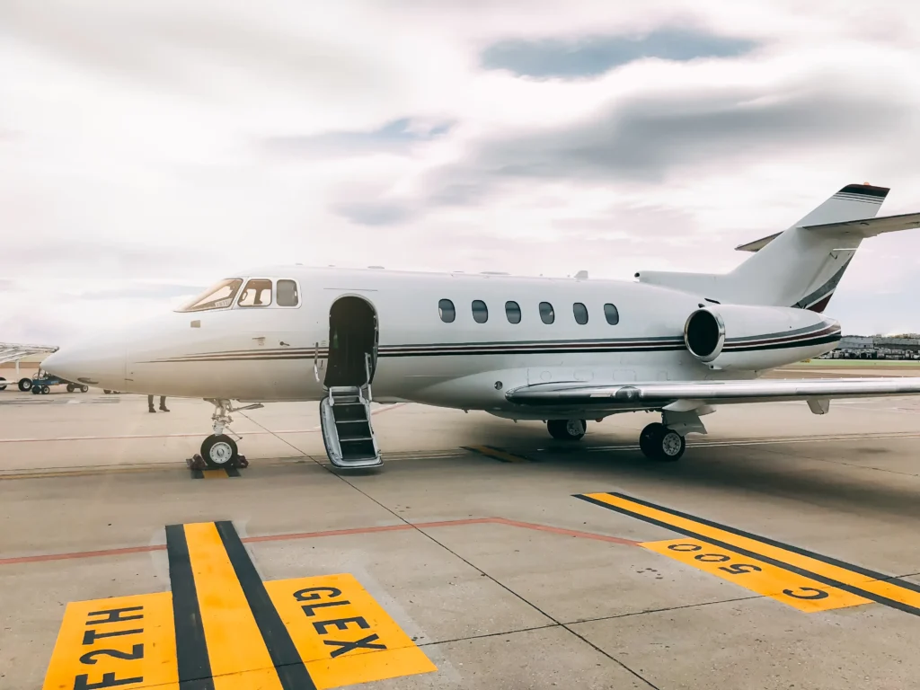 private luxury jet at airport terminal ready for boarding